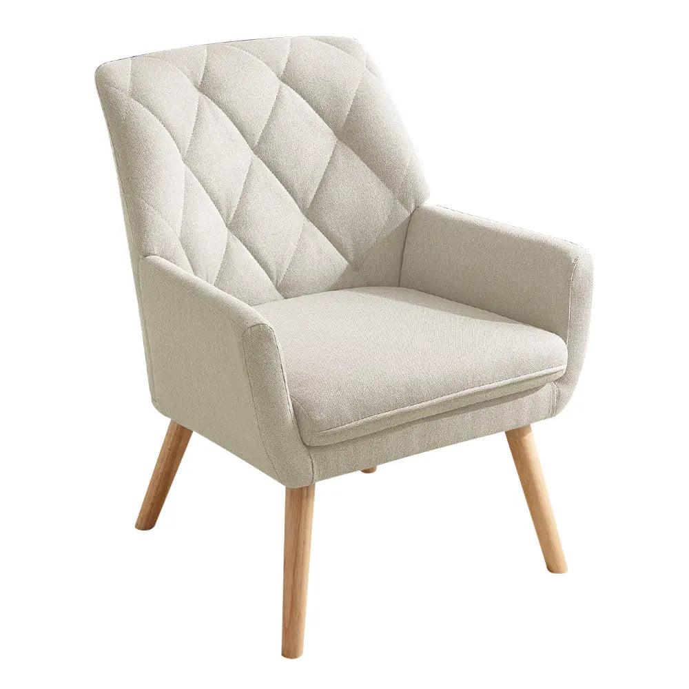 Camila armchair in a cozy bedroom nook with soft lighting