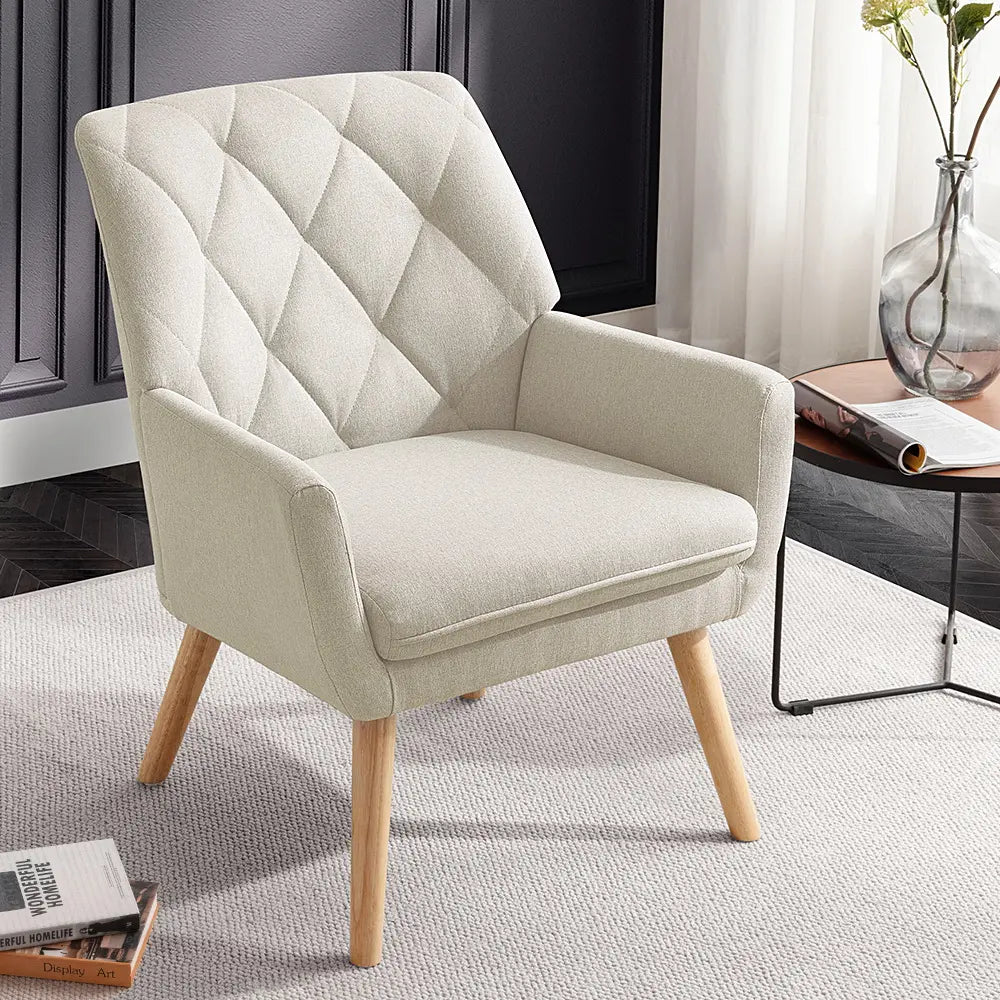 Elegant Camila armchair with neutral upholstery in a classic living room