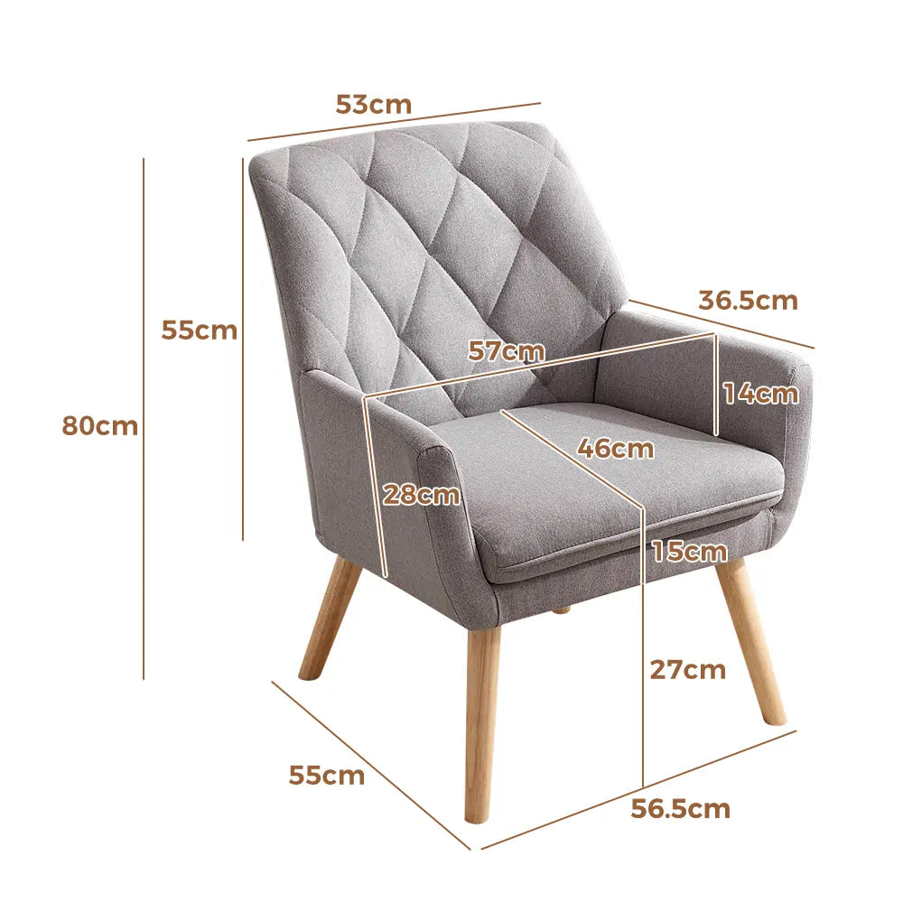 Side view of the Camila armchair showcasing its high backrest and sleek design