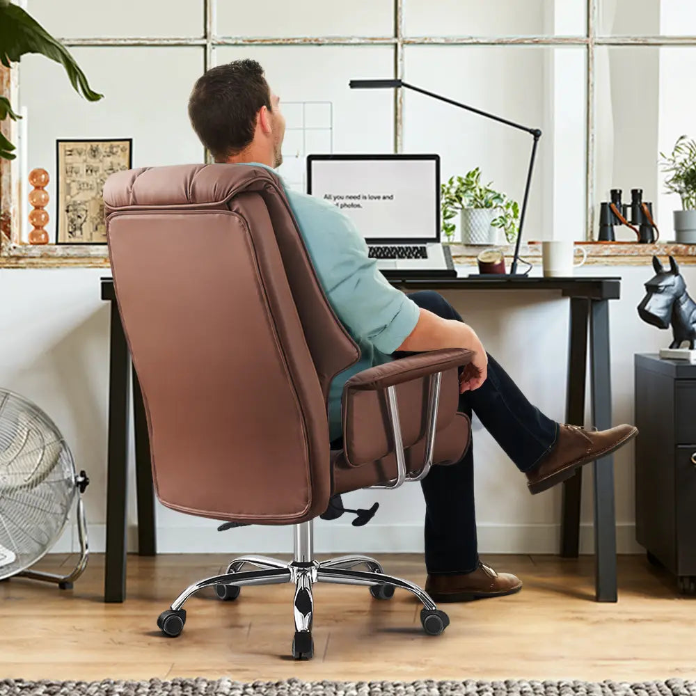 Sarif Faux Leather Executive Chair with adjustable height and tilt features