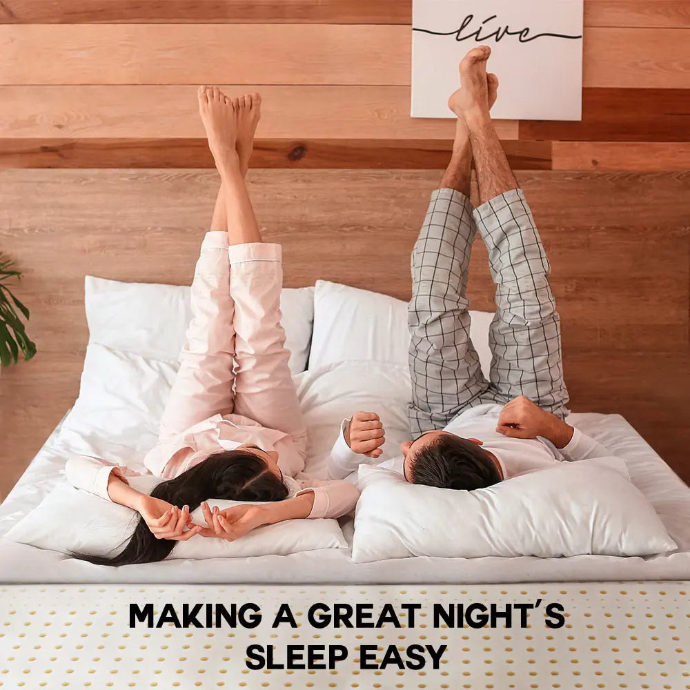 Lyric Natural Organic Latex Topper 75MM providing support on a queen-size mattress