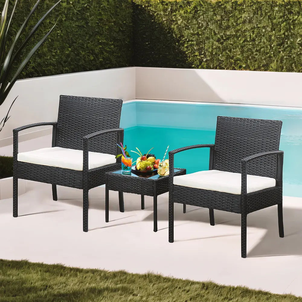 Side view of Laguna outdoor dining table with chairs in a garden