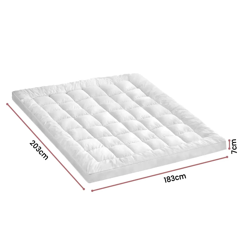 tylish white color of the Zoilo Mattress Topper in a minimalist bedroom setup