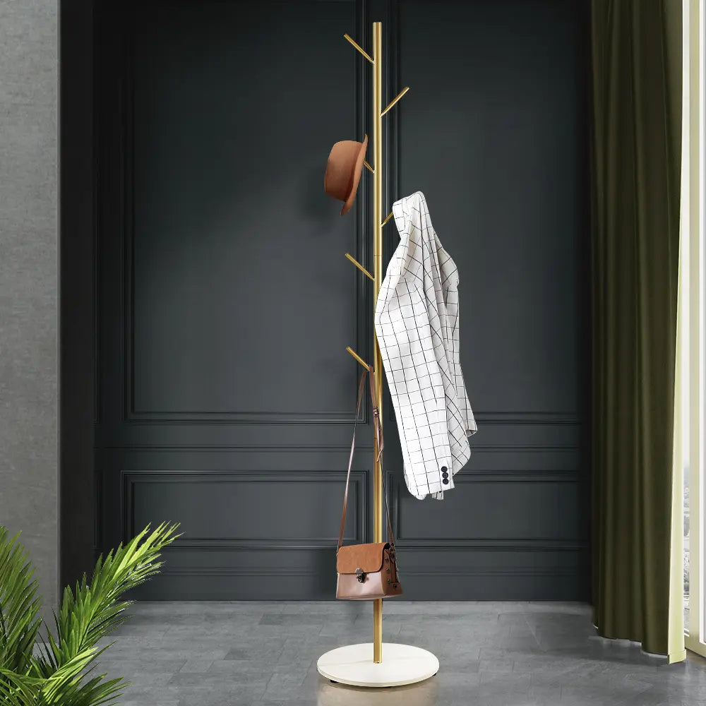 Sleek Index coat stand holding jackets and bags in a hallway