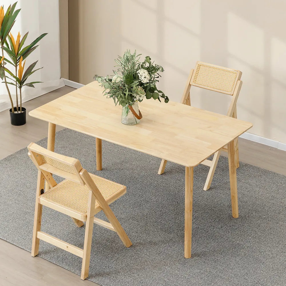 Rye Dining Chairs in a light-filled kitchen with a wood dining table