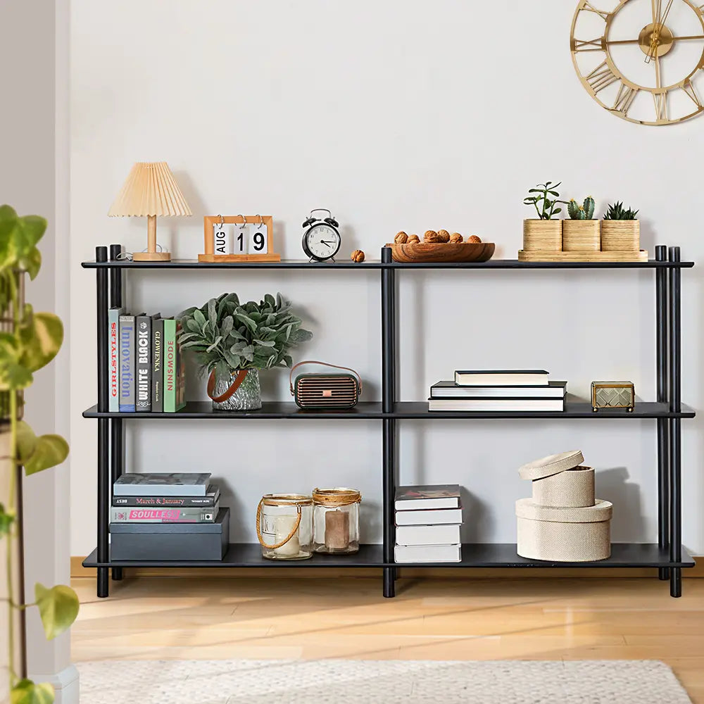 Kinsley bookshelves with books and décor in a modern living room