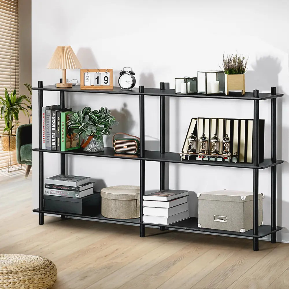 Side view of Kinsley bookshelves with books and decorative items