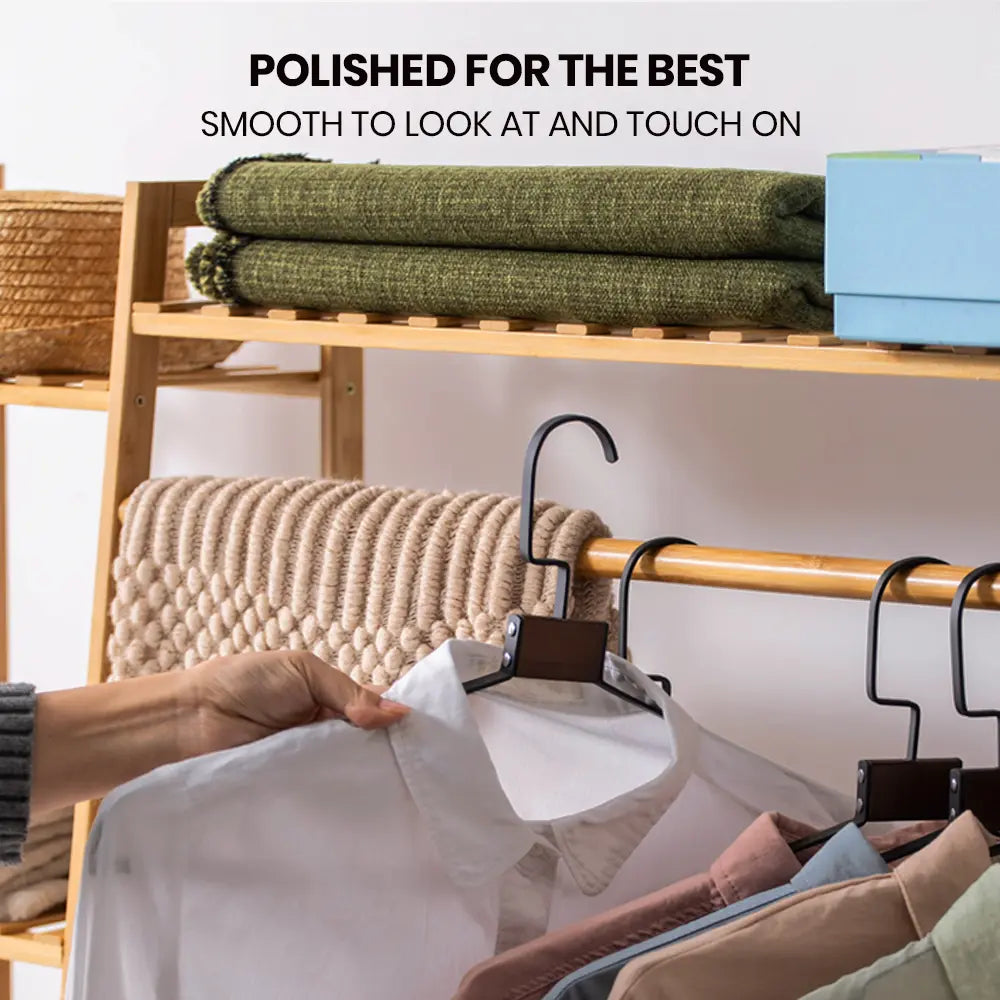 Billy 110CM garment rack displaying coats and accessories in entryway