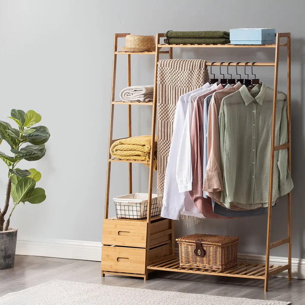 Natural wood Billy garment rack organizing clothes in a walk-in closet