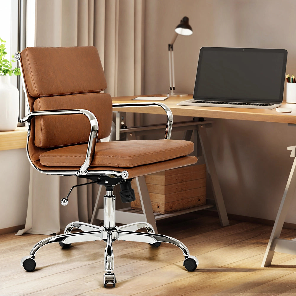 Eames replica chair with firm mid-back support in sleek office setting
