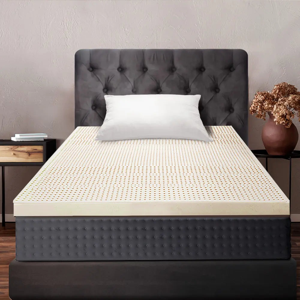 Lyric Latex Topper placed in a serene, minimalist bedroom setting