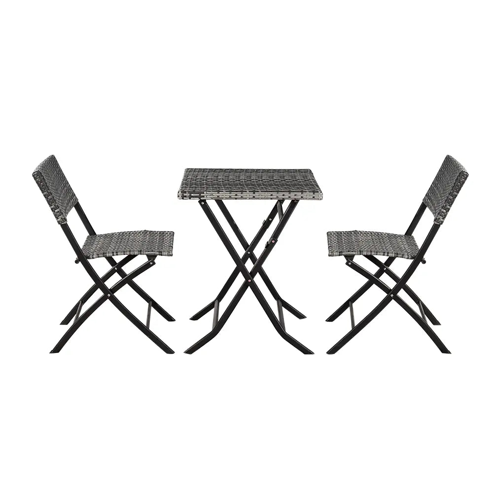 Hamilton outdoor foldable dining chair and table set in grey on a patio