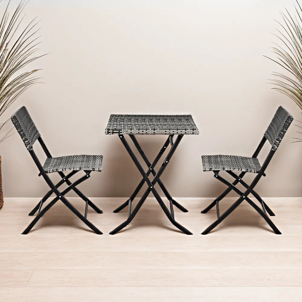 Side view of Hamilton foldable grey dining chairs with compact table