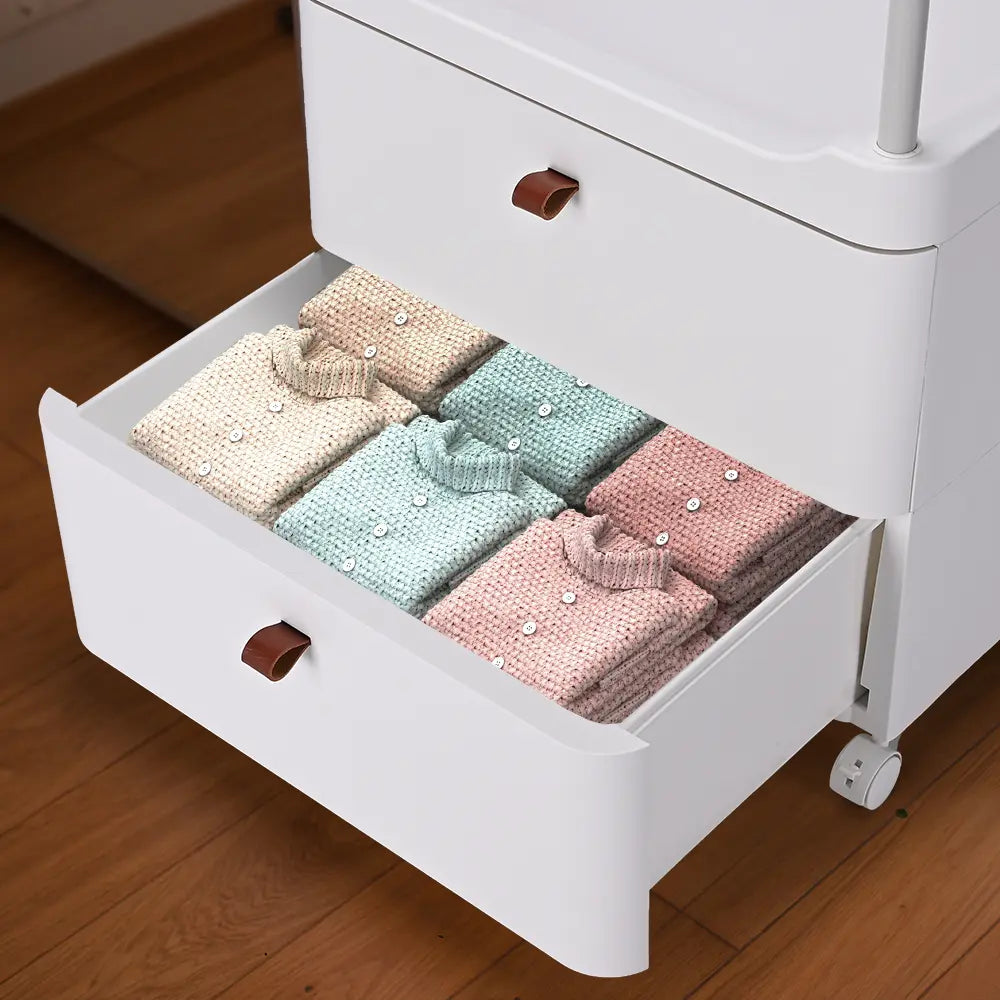 Spacious hanging rod of the Petervon Clothing Rack with Storage Drawer
