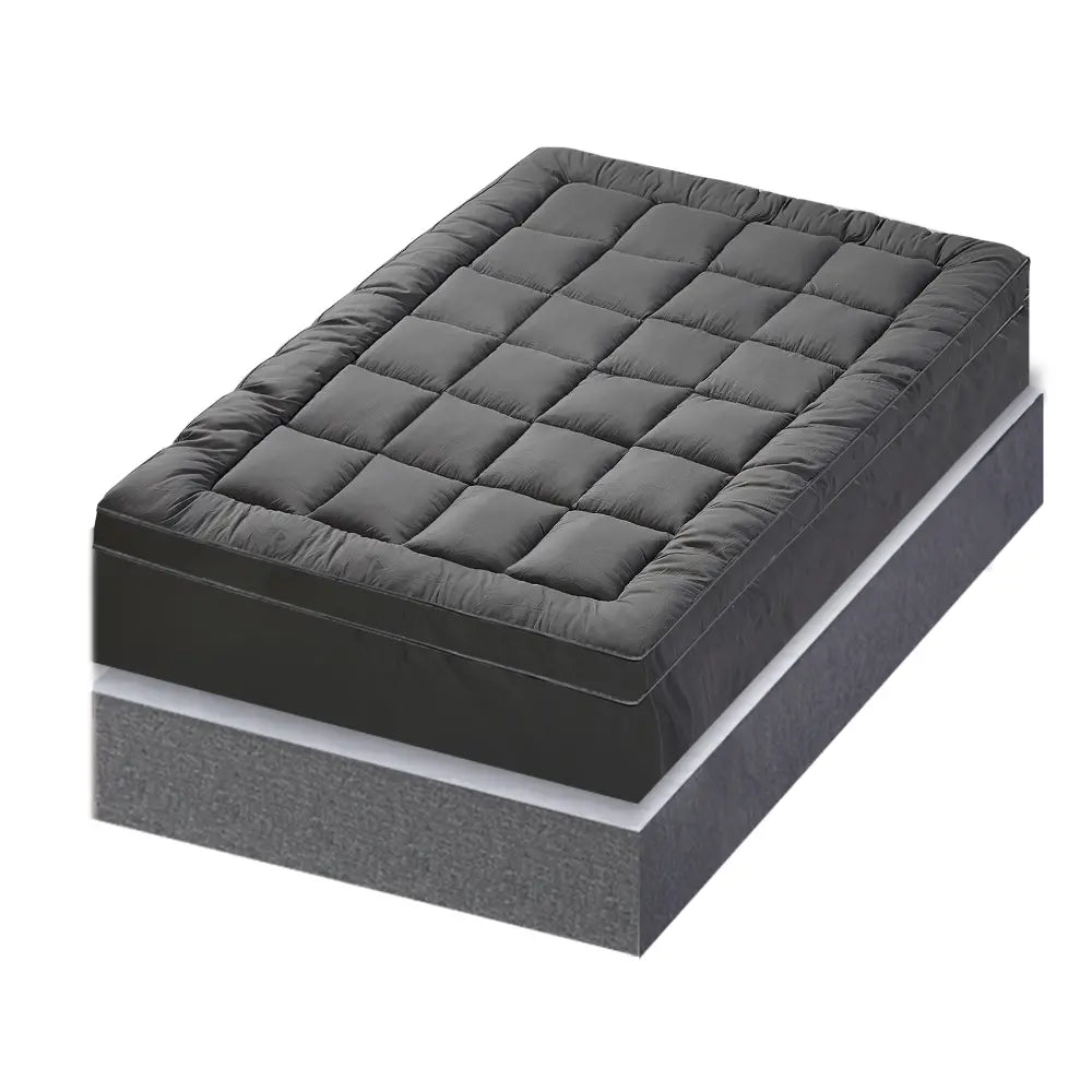 Elastic straps securing the Zoilo Cotton Mattress Topper on a mattress