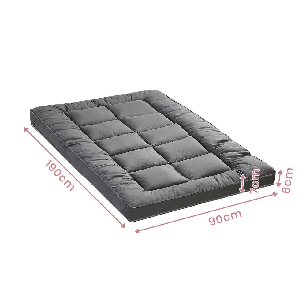Zoilo Mattress Topper providing extra comfort and support in a modern bedroom