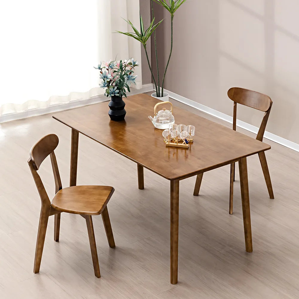 Haiku dining chairs paired with a glass dining table