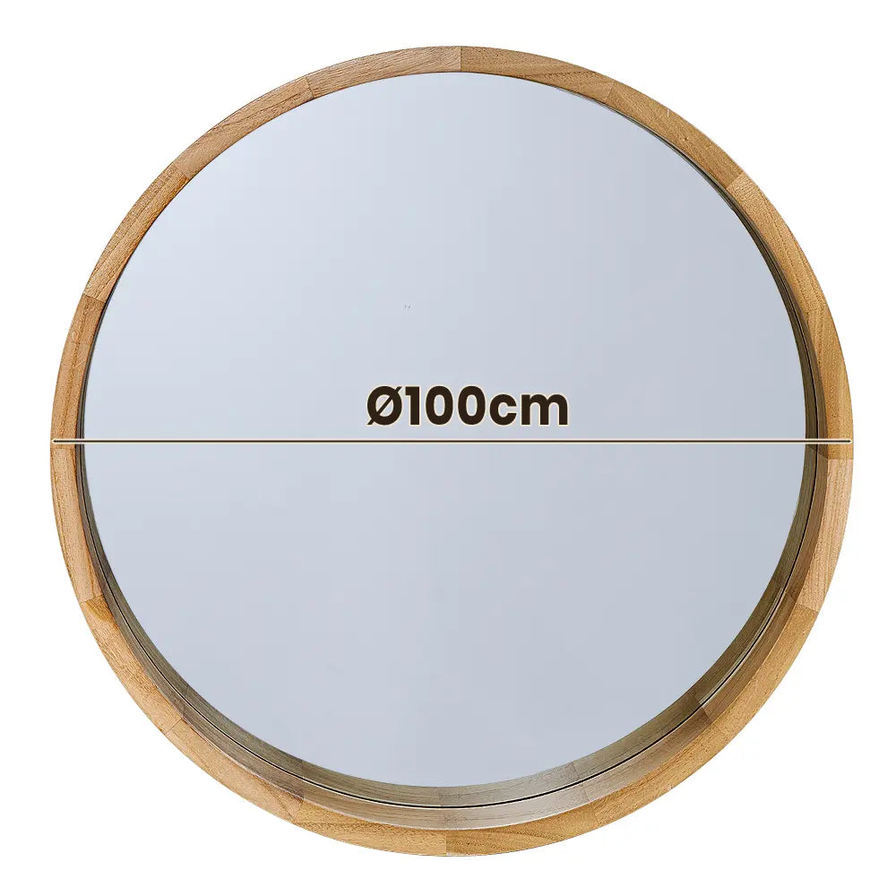 Tate Round Wall Mirror reflecting light in a spacious living room