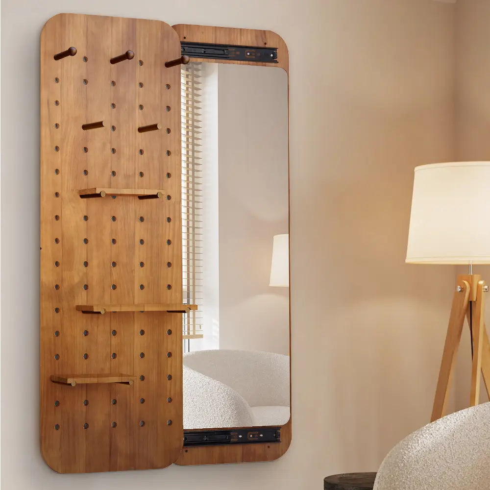 Close-up of sliding mechanism on Charlie wall mirror revealing hidden storage