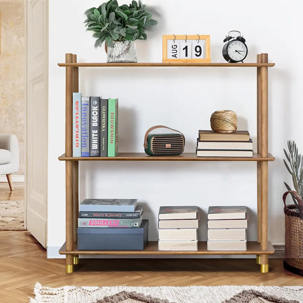 Elegant Esther bookshelves featuring brass feet and open shelves