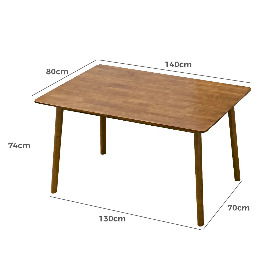 Family dining on the spacious Barron table with natural wood finish